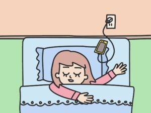 ベットのそばのコンセントがある寝室